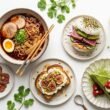 jalbiteblog trend food — vibrant flat-lay of viral 2025 food items including chili oil ramen, matcha dessert, mini plates, and fusion street food on a clean white surface